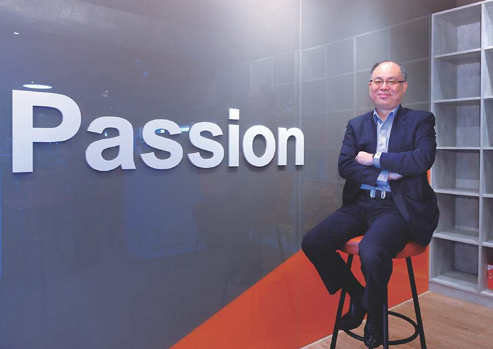 ●國泰證券總經理周冠成表示,正向源源不絕的循環,讓國泰證券得以力行普惠金融。圖/王德為 image