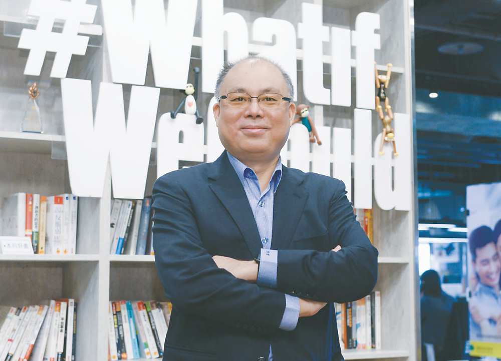 ←國泰證券總經理周冠成日前接受專訪,暢談公司數位發展。圖/王德為 image