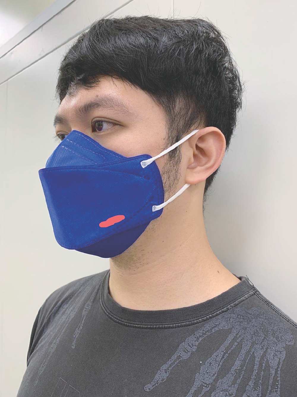 ●翼慶企業KF94立體型3D口罩,其飛沫防護力高於平面型,已獲國家級MD品質認證,為公司帶來新商機。圖/翼慶企業提供 image