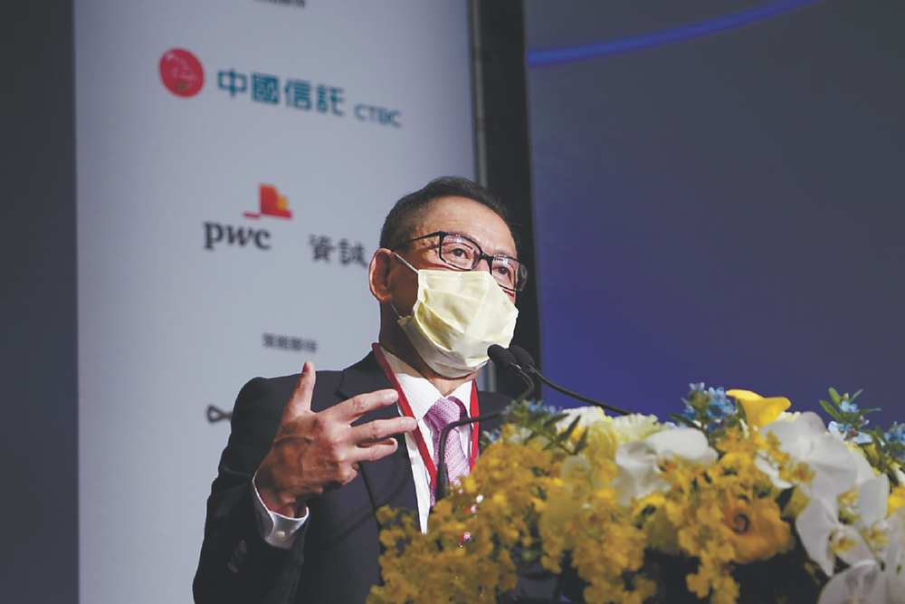 ●中國信託銀行董事長利明献參加天下雜誌主辦的「天下經濟論壇」,提出台灣面對全球經濟新局三大方向。圖/天下雜誌提供 image