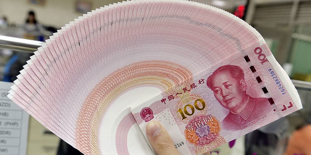 中沙建立雙邊本幣互換安排,將有助於加強兩國金融合作。圖/中新社 image