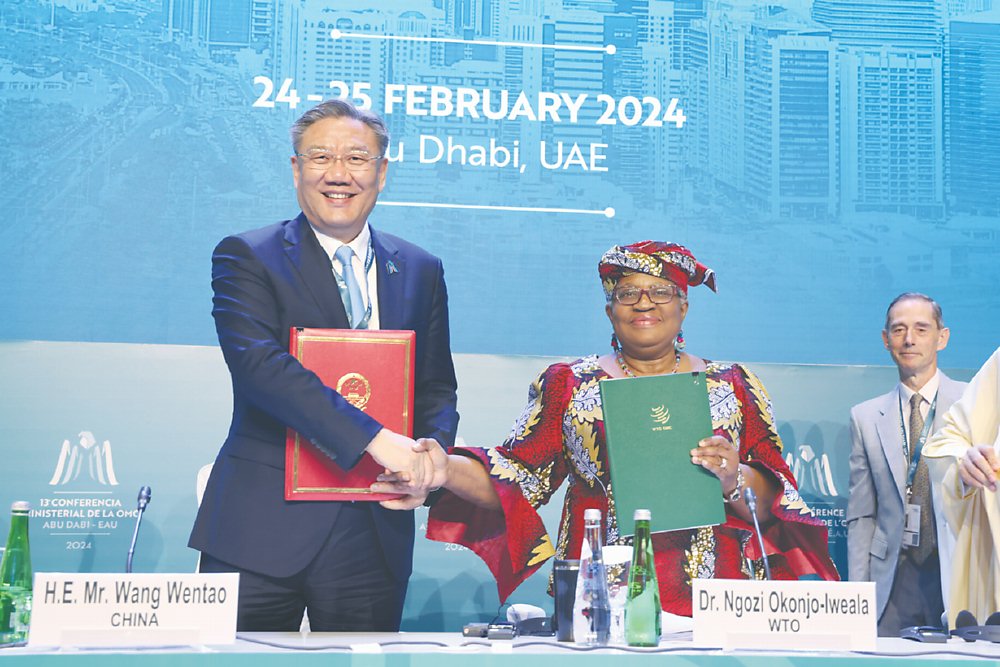 世界貿易組織(WTO)第13屆部長級會議26日至29日在阿拉伯聯合大公國登場,中國商務部長王文濤率團出席,並於25日率先會見WTO秘書長伊衛拉(Ngozi Okonjo-Iweala)。圖/新華社 image