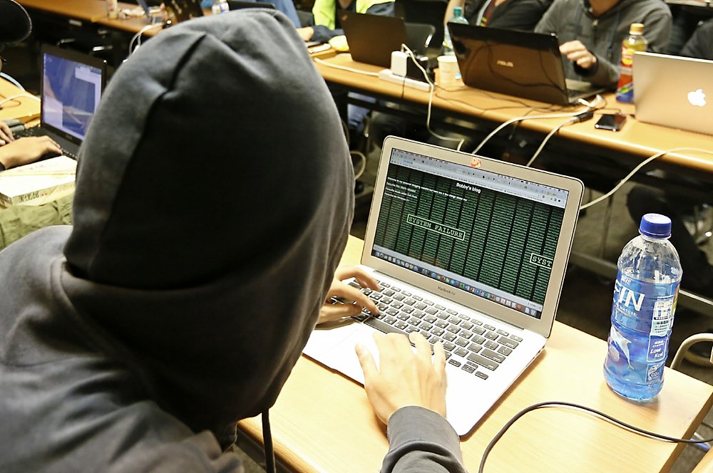 台灣政府致力於強化各公部門相關單位的資安應對措施,並透過培訓提升各部門人員的資安意識。圖/本報資料照片 image