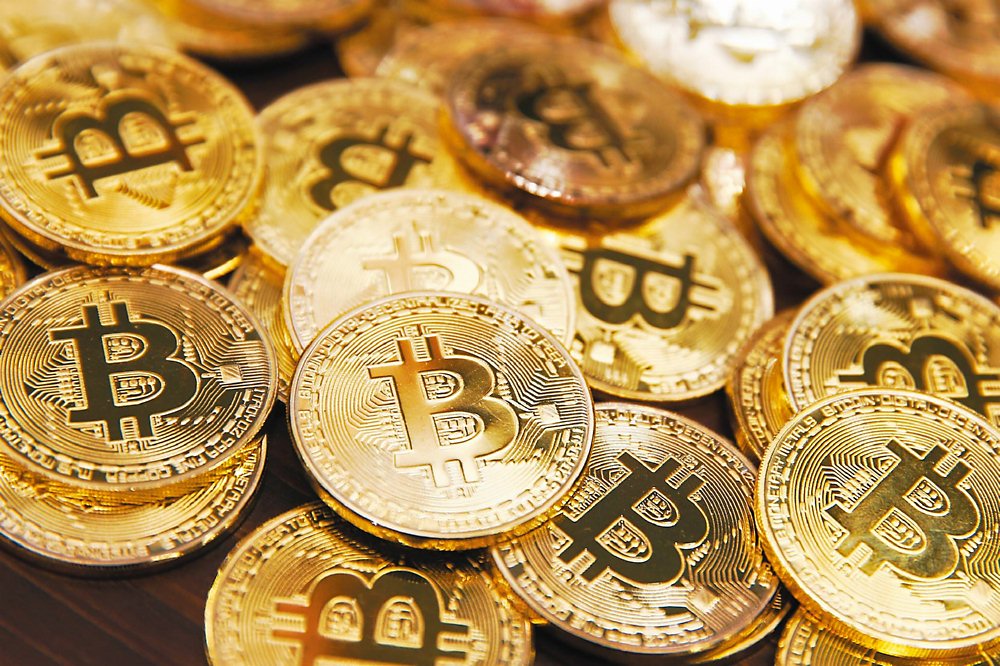 幣圈專家分析,比特幣技術線型突破關鍵價位6萬4,555美元,預期幣價接下來走勢良好,有望突破前高7.3萬美元,且今年推估的高點10萬美元也有望達標。圖/本報資料照片 image