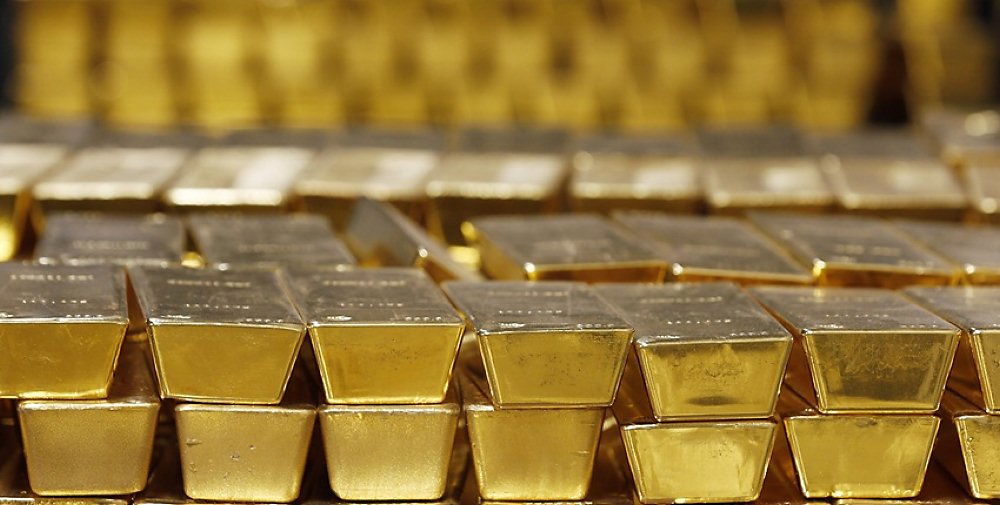 市場對美國經濟衰退的憂慮,讓金價大幅波動。圖/美聯社 image