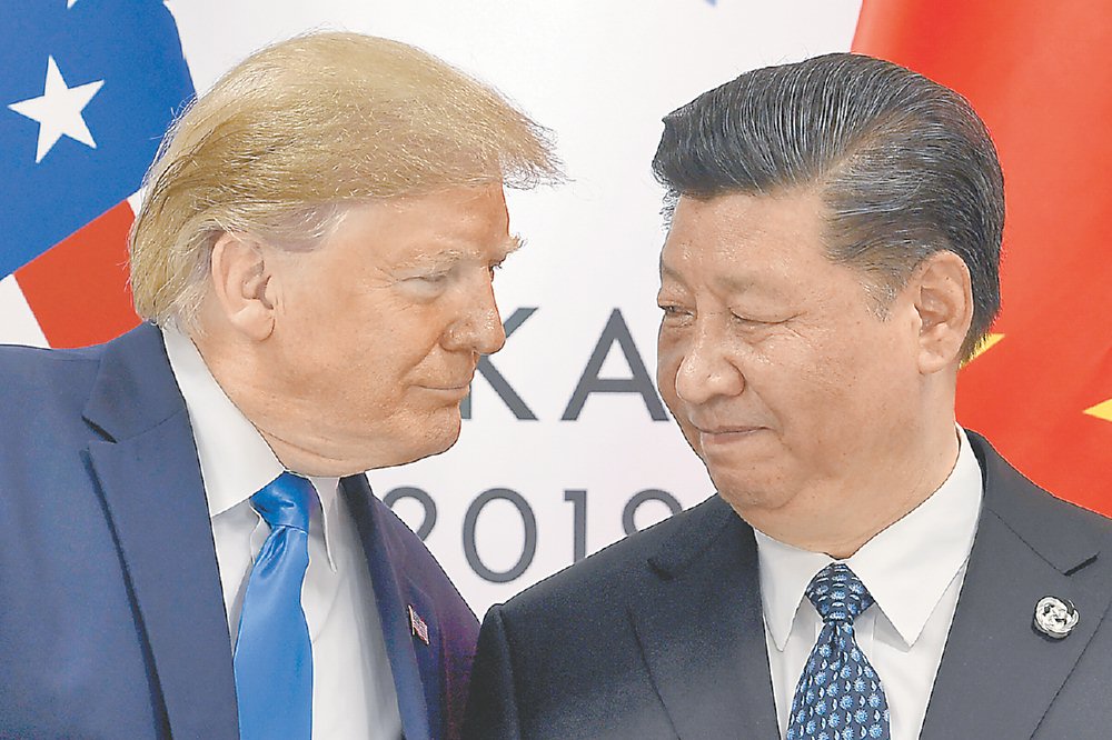 圖為2019年在日本舉行的G20峰會上,時任美國總統的川普與中國國家主席習近平會面。圖/美聯社 image