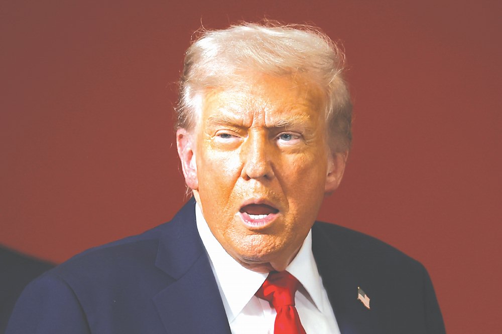 攸關10月底習川會能否順利舉行的中美第五輪經貿高層會談,本周末將在馬來西亞首都吉隆坡登場,美國總統川普透露本次會談的三大議題,包括稀土、大豆和芬太尼。圖/美聯社 image